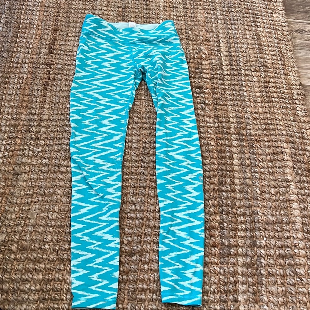 Ivivva leggings, zig zag teal and white. Girls size 12. Worn 2 or 3 times. EUC.